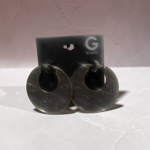 GUESS black glitter crescent hoop earrings from the brand G by GUESS